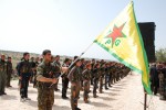Nástup členov kurdských Jednotiek ľudovej obrany. Zdroj: www.haber.sol.org.tr